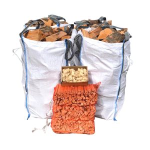 Savers firewood bundle with four bags of logs, three nets of kindling and a box of natural firelighters.